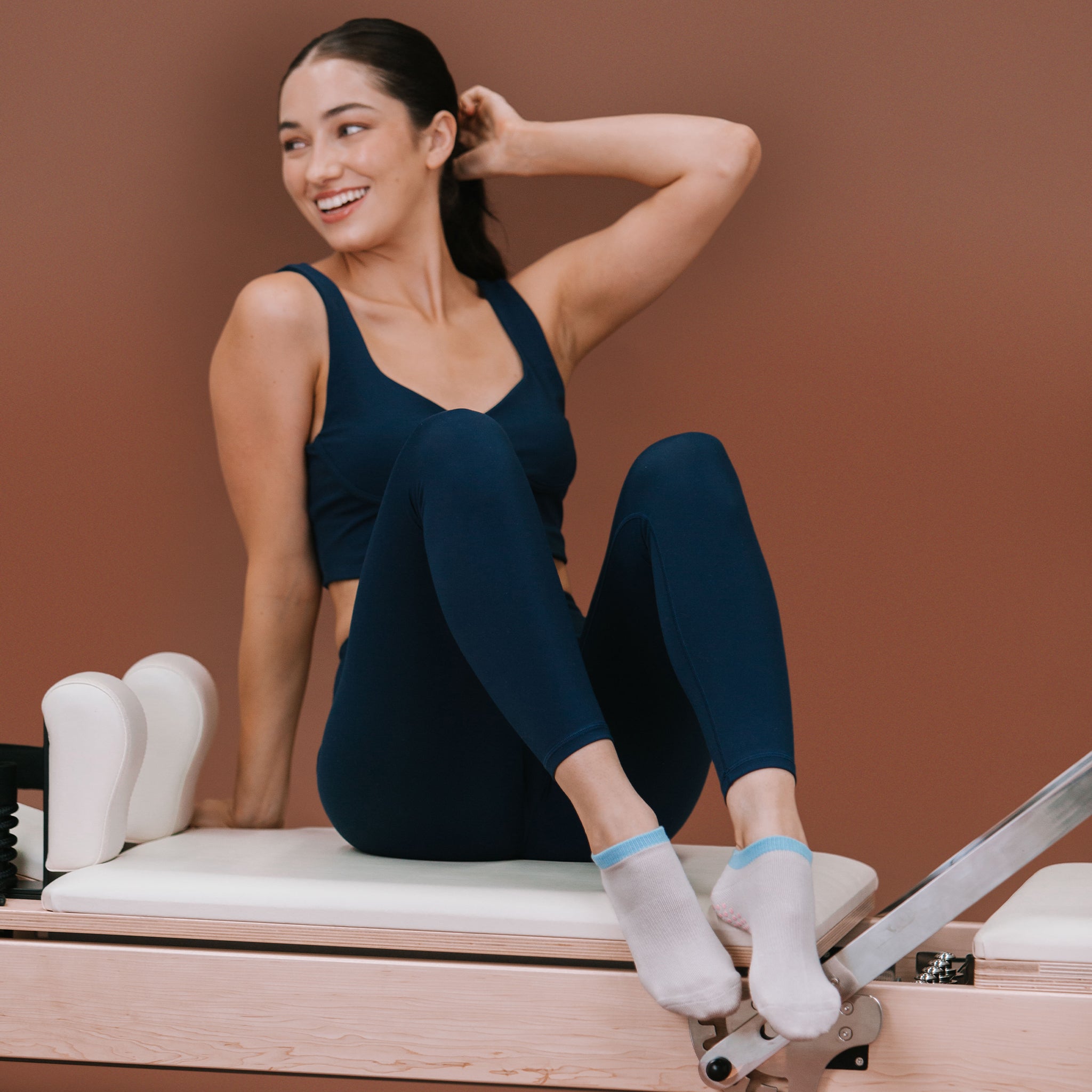 White Striped Ankle Grip Socks - Lifestyle Shot | Your Reformer