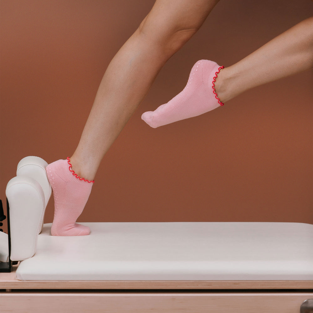 Pink Reformer Ankle Grip Socks - On Model Pilates | Your Reformer